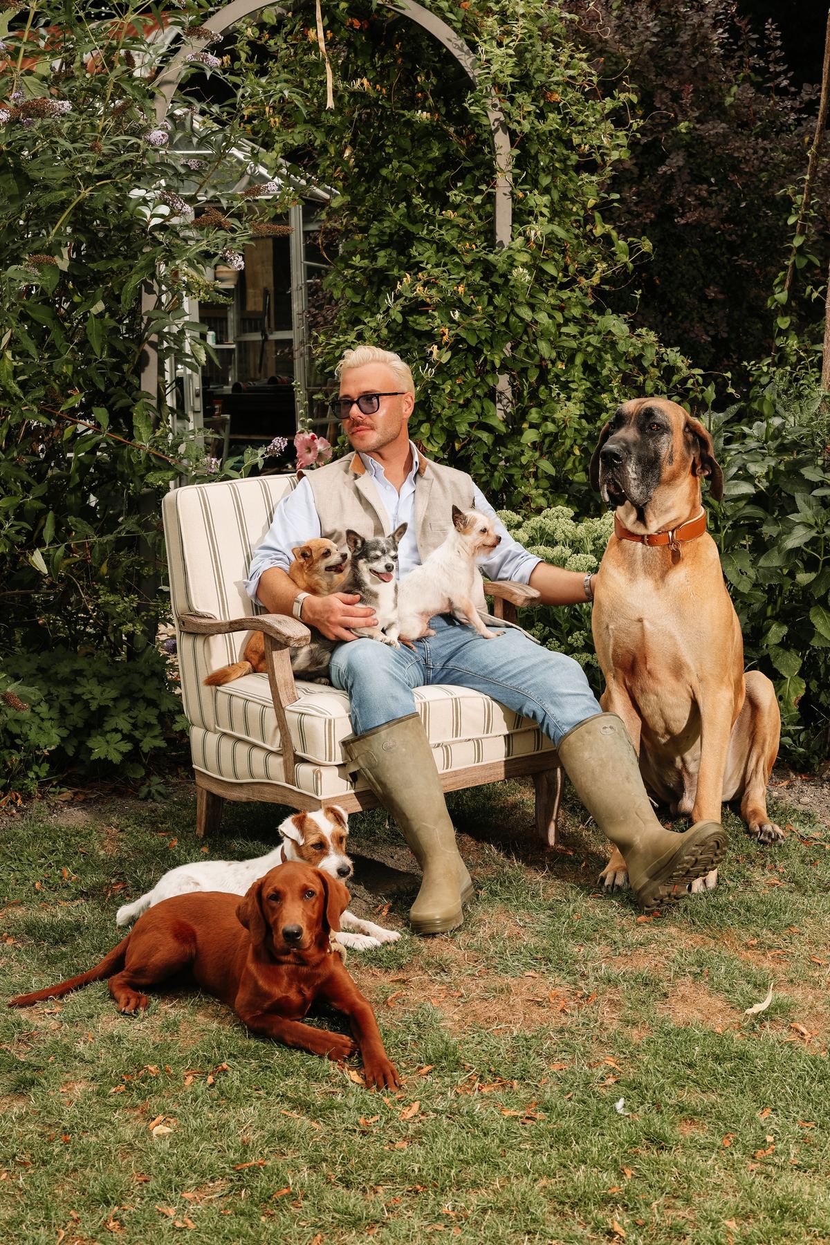James in the garden with his dogs